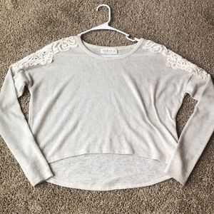 Light grey top with white shoulder details!